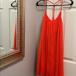 Red sundress with accordion skirt